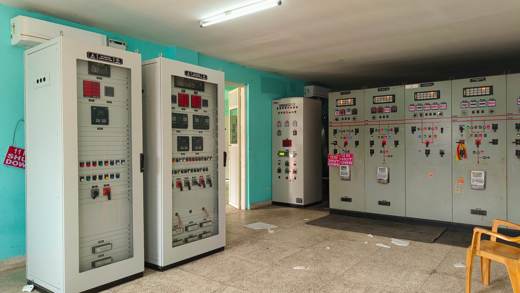 New control and relay panels installed next to existing panels in the control room